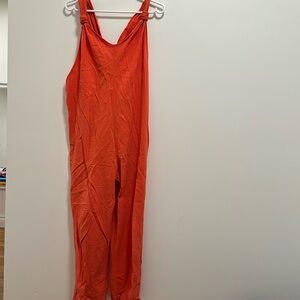 Coral sleeveless jumpsuit.